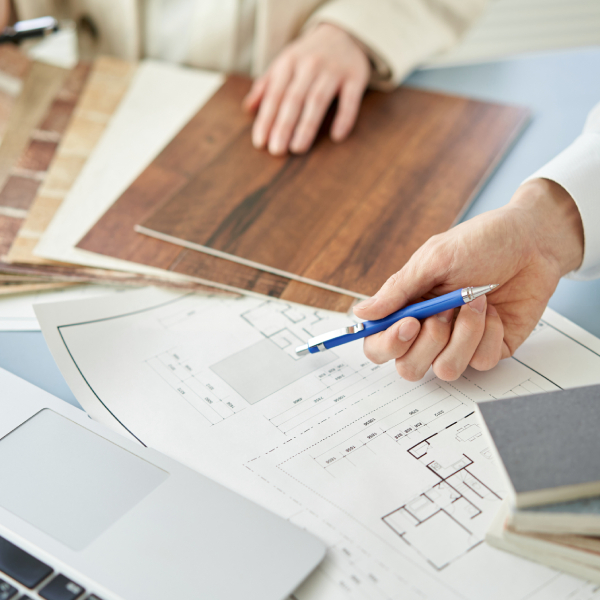 Architects planning and designing custom cabinets.