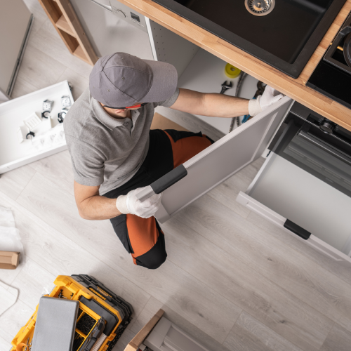 Professional Kitchen Cabinetmaker Installing Custom Cabinets Inside Thousand Oaks home.<br />
